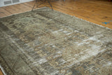 Distressed vintage Kula runner showcasing faded charcoal, silver, and beige geometric pattern.