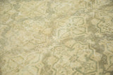 Distressed vintage Oushak texture, highlighting time-softened sea foam green motifs.