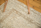 Distressed Vintage Oushak rug showing even wear and pale beige, charcoal tones.