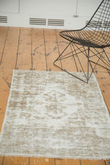 Blanket stitched end of the distressed vintage Oushak rug with visible foundation weave.