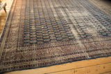 Vintage Distressed Sparta carpet corner, deep navy field, boteh pattern, heavy abrash.
