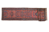 Persian Lilihan rug runner with madder root red field and elongated indigo floral design, 3'1