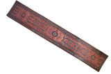 Elongated vintage Lilihan runner rug with madder red field and sprawling blue floral bouquets.