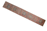 Distressed vintage Hamadan runner with repeating floral medallions in blush and sky blue, 2'5
