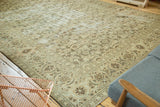 Distressed corner of a Sivas carpet, with faded Herati motif and lotus palmette border.
