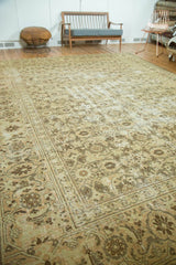 Distressed Sivas carpet corner with faded Herati and lotus palmette border motifs.