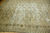Distressed Turkish Sivas carpet with faded Herati pattern, oxidized silver, and lotus palmette border.