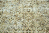 Distressed Sivas carpet texture, showing visible foundation and muted beige and brown patterns.