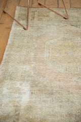 Distressed pile texture with soft pale blush, beige, and oxidized silver tones.