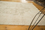 Soft, worn pile of the distressed Oushak runner with faded floral motifs.