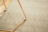 Distressed, low pile surface of the vintage Oushak rug, showing its subtle Mir Boteh pattern.