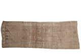 Distressed Oushak runner with faded blush, rose, and sand tones and geometric medallion, 3'6