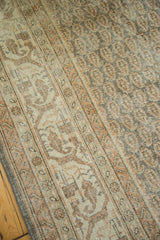Softened Mir Boteh and vinery patterns on a vintage distressed Oushak carpet.