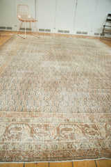 Vintage distressed Oushak rug border, with sprawling vinery and faded, textural Mir Boteh.