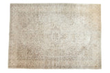 Distressed vintage Oushak rug featuring central medallion, thousand-flower design, muted ivory, 8'10