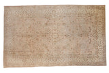 Distressed vintage Oushak carpet, central medallion with lotus tendrils in pale beige and ivory, 7'2