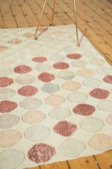 Distressed Oushak runner: playful geometric circles in ivory, blush, and soft green.