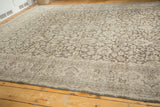 Distressed vintage Sivas rug with even wear, subtle palmette and lotus motif.