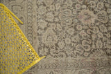 Vintage Distressed Sivas carpet showing even wear and palmette motifs in beige and brown.