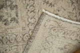 Distressed Sivas carpet showing even pile wear, exposed foundation, and woven back.