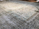 Antique Persian Khorossan hand knotted carpet, circa 1920s, muted blue and beige floral patterns, even wear, 10' x 12'8