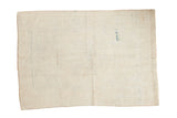 Vintage distressed Oushak rug back, revealing its ivory hand-knotted foundation and secured selvages.