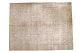 Distressed Oushak carpet with decorative triple medallion, muted ivory and beige botanical motifs, 10'1