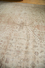Worn distressed pile of vintage Oushak carpet, revealing knot heads and foundation.