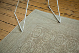 Detail of a vintage distressed Kaisary carpet with tone-on-tone gul motifs and borders.