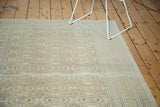 Distressed Kaisary carpet, repeating gul motif, intricate border, subtle abrashes, silver brown tones.