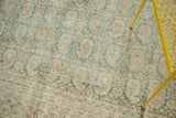 Distressed Oushak carpet showcasing Mir Boteh design, vinery, and distinct barber pole border.