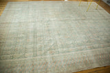 Distressed Oushak rug corner with sea foam green Mir Boteh and alternating barber pole border.