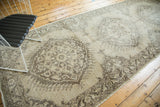 Faded Oushak-inspired serrated medallion and distressed texture on a vintage Sparta runner.