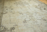 Distressed vintage Sparta rug pile showing hand-knotted texture and faded charcoal patterns.
