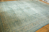 Distressed vintage Persian Mahal border, teal Herati motif, and pale terra cotta turtle design.