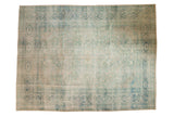 Distressed vintage Meshed carpet with faded teal and pale gold floral motif, 9'1