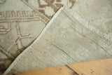 Hand knotted foundation, secured edge, and fringe of the vintage distressed Kula carpet.
