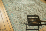 Distressed Mahal carpet with faded allover Herati motif in charcoal, beige, and teal.