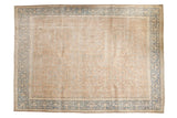 Distressed vintage Persian carpet, allover vine and vase pattern, dusty blush field, muted blue border.