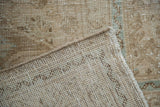 Distressed Mahal carpet, hand-knotted, showing worn pile texture and light foundation.