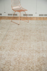 Vintage distressed Mahal carpet: dusty beige allover Herati pattern and trefoil border detail.