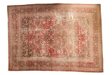Distressed vintage Persian Tabriz carpet, black cherry red medallion and Herati field.
