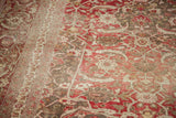 Distressed Tabriz carpet detail: Oversized Herati motif with black cherry, antique ivory, dark chocolate.