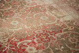 Vintage Distressed Tabriz with oversized Herati motif in red, brown, and ivory.