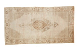 Distressed Oushak rug with stepped medallion, lattice spandrels, in beige and bronze. 3'9
