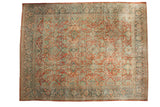Distressed vintage Mahal carpet, curvilinear floral motifs in terracotta, teal, and ivory, 10'8