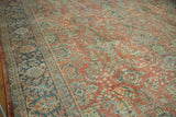 Distressed Mahal carpet border with terra cotta, teal curvilinear floral patterns and even wear.