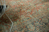 Distressed Mahal carpet detail: faded terra cotta, teal, and ivory curvilinear floral design.