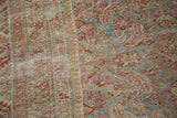 Distressed antique Malayer runner texture, showing exposed foundation, slate blue, and faded red.