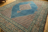 Distressed Mahal rug corner: watery blue field, stepped floral spandrel, pistachio and blush borders.
